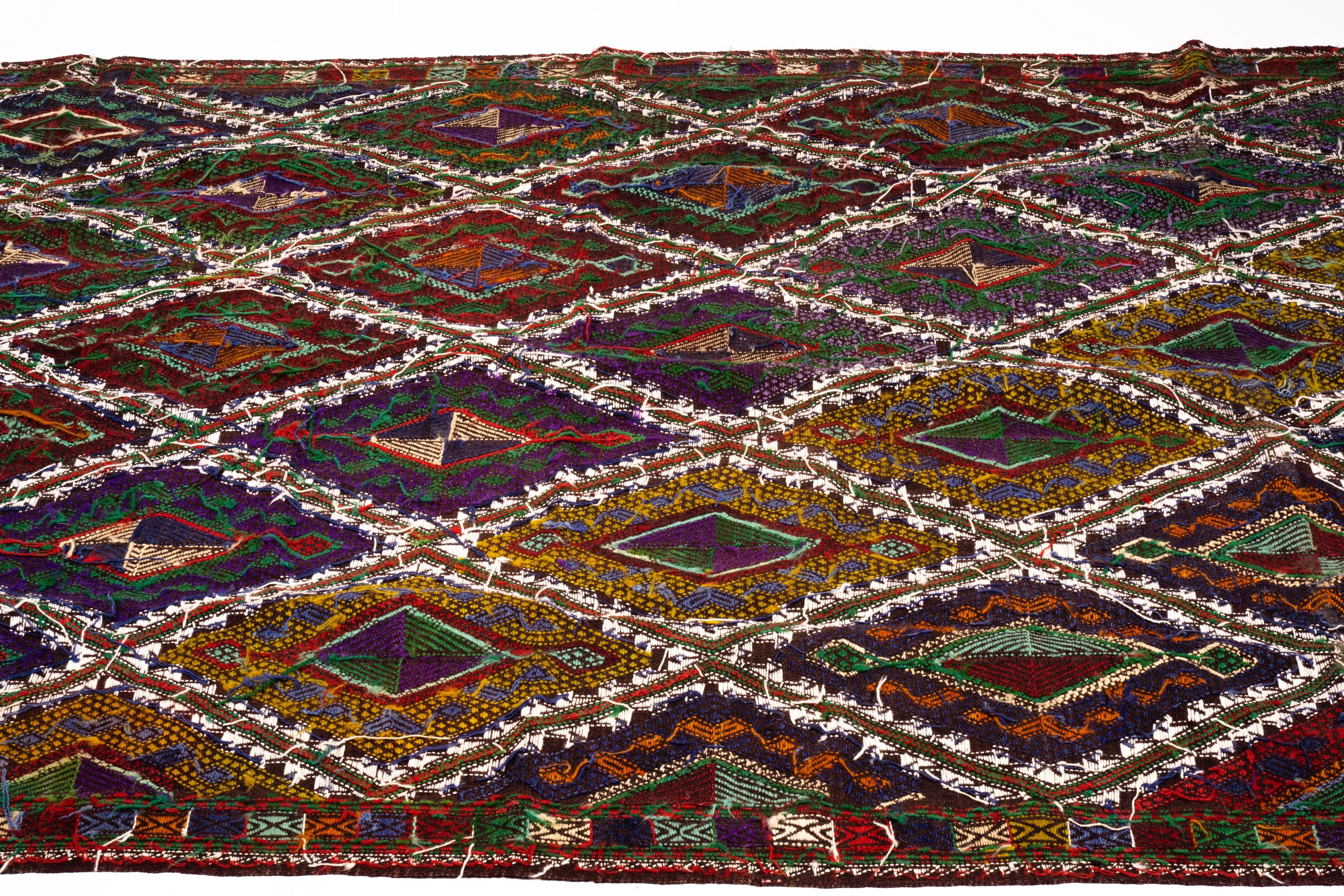 A Moroccan wool tile pattern rug, 240 x 160cm